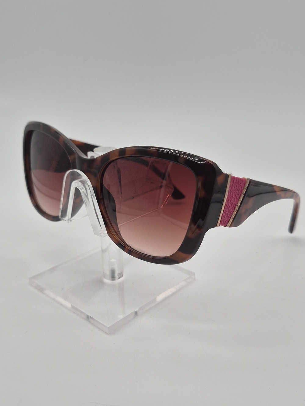 Anne Klein Tortoiseshell Sunglasses with Pink Temple Detail